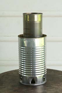 Student set up using two 15 oz cans and a larger outer can for safety and to protect the fire from wind gusts.