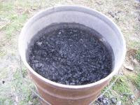 A bucket full of charcoal
